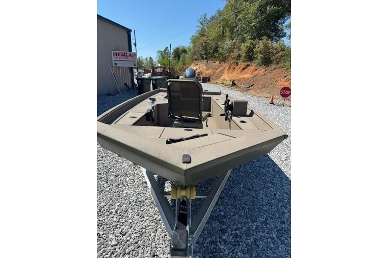 Slide: The Image of 2025 Alweld 1856PF boat on gravel, featuring a spacious deck and modern design. - 7