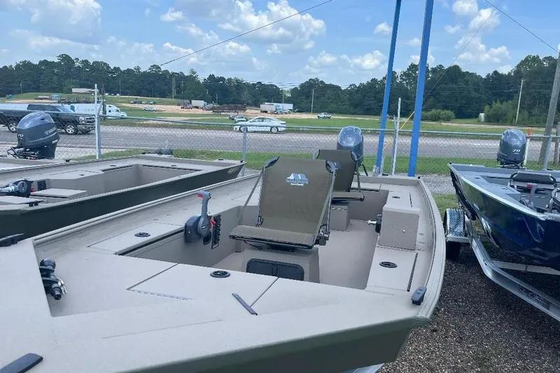 Slide: The Image of 2025 Alweld 1856PF boat displayed outdoors, featuring spacious seating and modern design. - 8