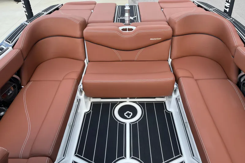 Slide: The Image of Luxurious seating in 2020 MasterCraft XT23 boat with brown upholstery and sleek design. - 14