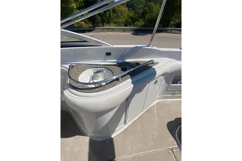 Slide: The Image of 2007 Crownline 252 EX boat interior with sink and countertop detail. - 6