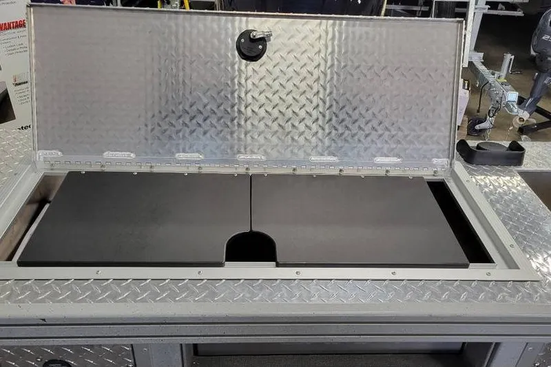 Slide: The Image of Aluminum storage compartment on 2025 Smoker Craft Phantom 20 X2 OS boat. - 13