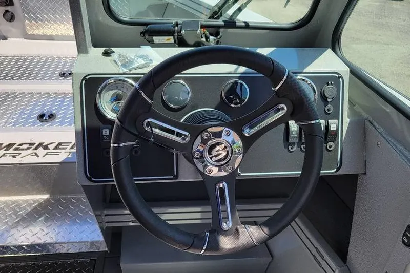Slide: The Image of Steering wheel of 2025 Smoker Craft Phantom 20 X2 OS boat cockpit. - 16
