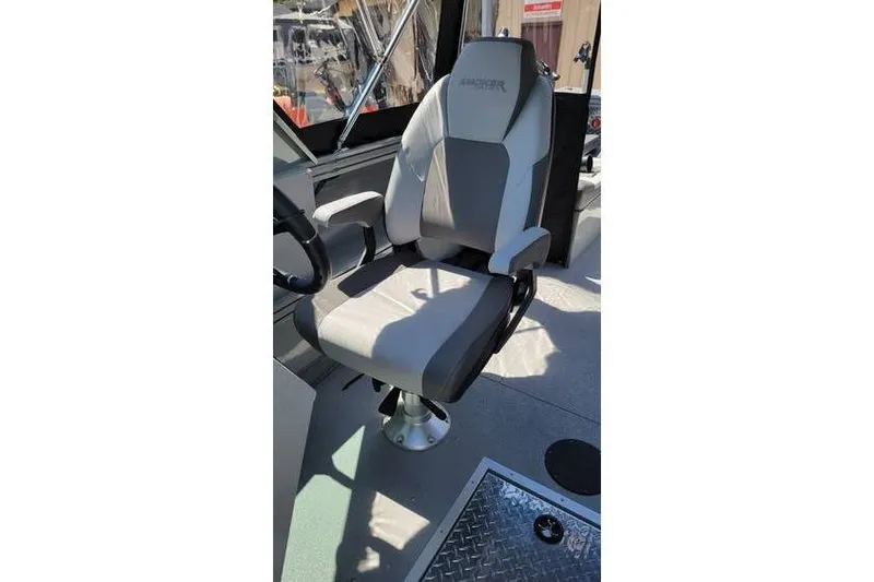 Slide: The Image of Captain's chair in 2025 Smoker Craft Phantom 20 X2 OS boat interior. - 21