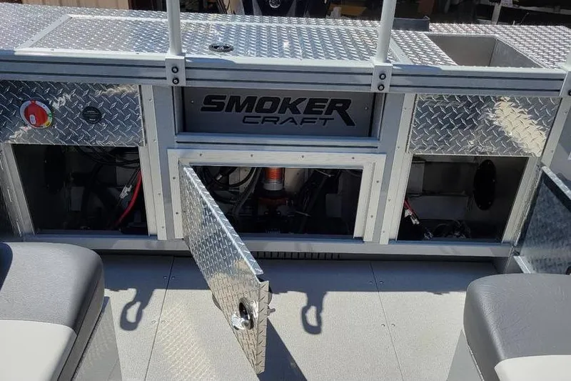 Slide: The Image of 2025 Smoker Craft Phantom 20 X2 OS boat interior with open storage compartments. - 24