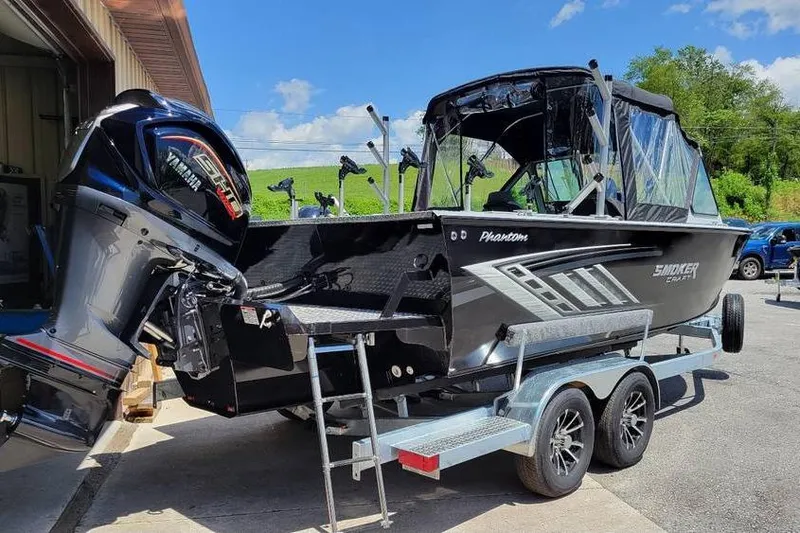 Slide: The Image of 2025 Smoker Craft Phantom 20 X2 OS boat on trailer, featuring Yamaha outboard motor. - 4