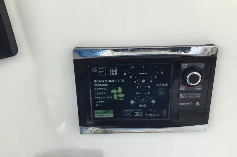 Slide: The Image of Control panel of a 2016 Mako 284 Center Console boat, displaying system diagnostics. - 21