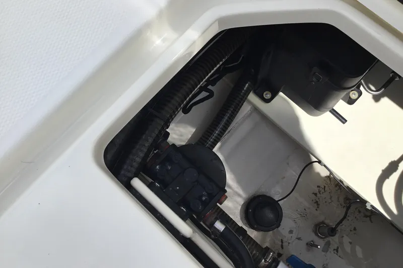 Slide: The Image of 2016 Mako 284 Center Console boat interior wiring and components. - 35