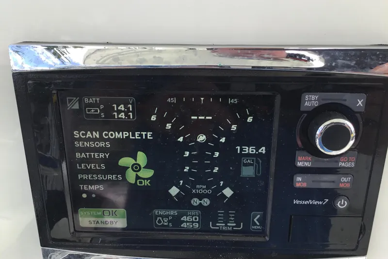 Slide: The Image of Boat control panel display on 2016 Mako 284 Center Console, showing system diagnostics and fuel level. - 50