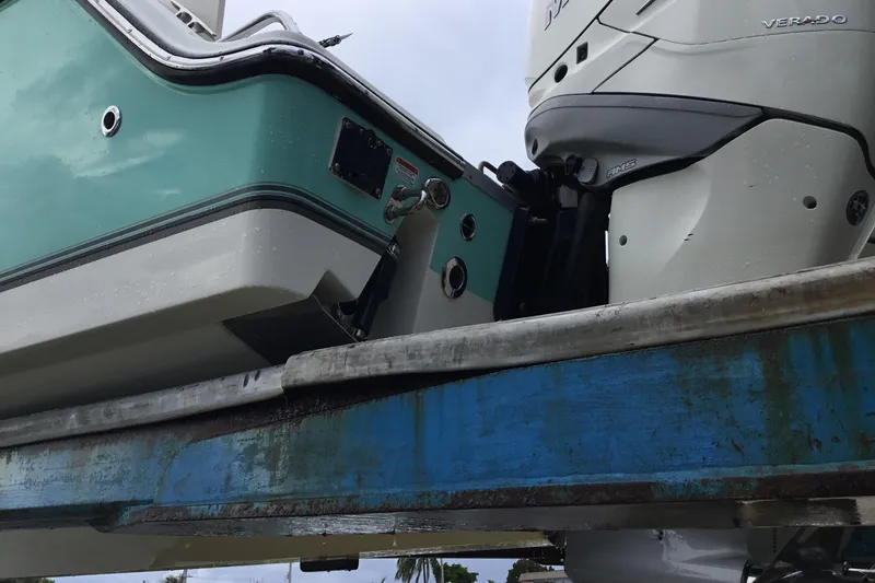 Slide: The Image of 2016 Mako 284 Center Console boat with Verado engine on a trailer. - 80