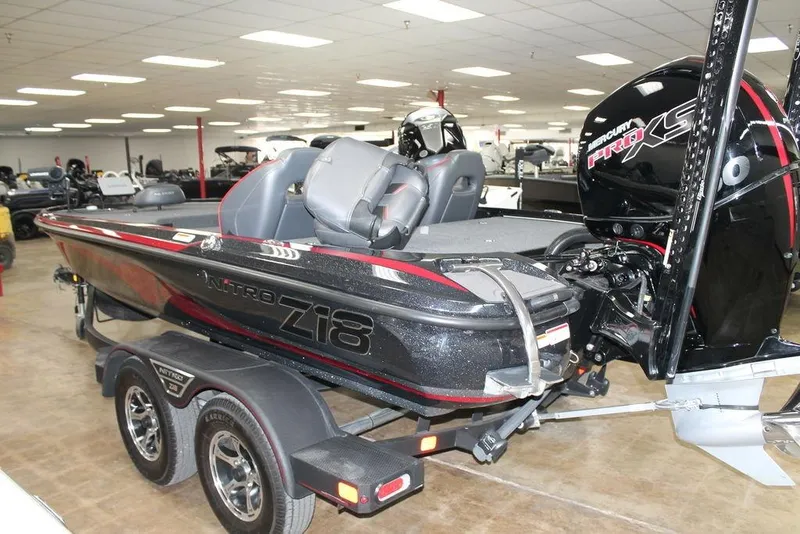 Slide: The Image of 2022 Nitro Z18 Pro boat with Mercury Pro XS engine in showroom. - 1