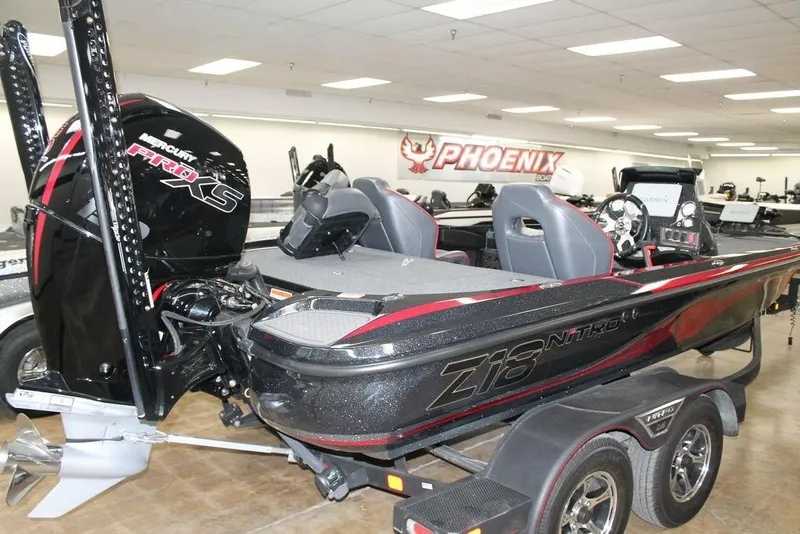 Slide: The Image of 2022 Nitro Z18 Pro boat with Mercury Pro XS engine in showroom. - 3