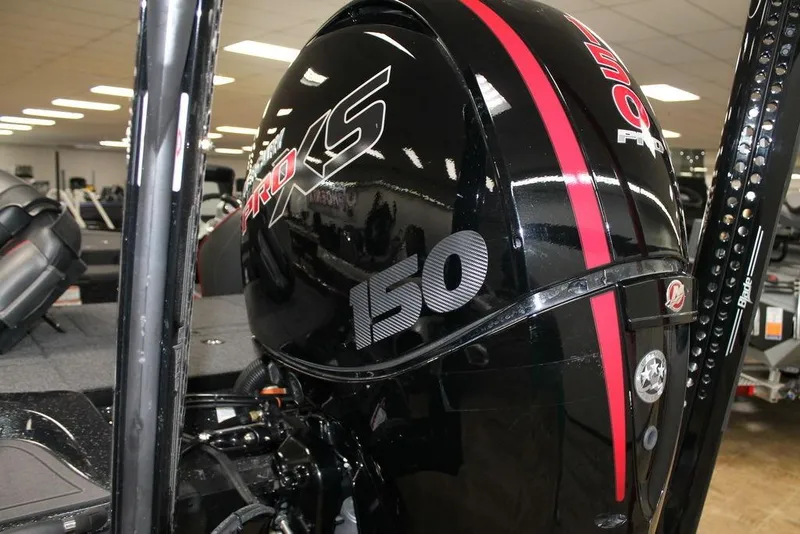 Slide: The Image of Nitro Z18 Pro 2022 boat engine, black with red accents, indoors. - 4