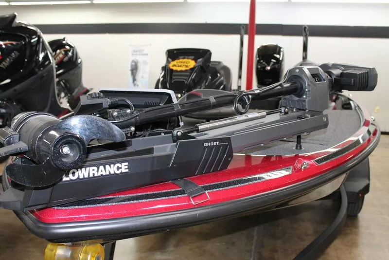 Slide: The Image of 2022 Nitro Z18 Pro boat with Lowrance Ghost trolling motor, displayed indoors. - 5
