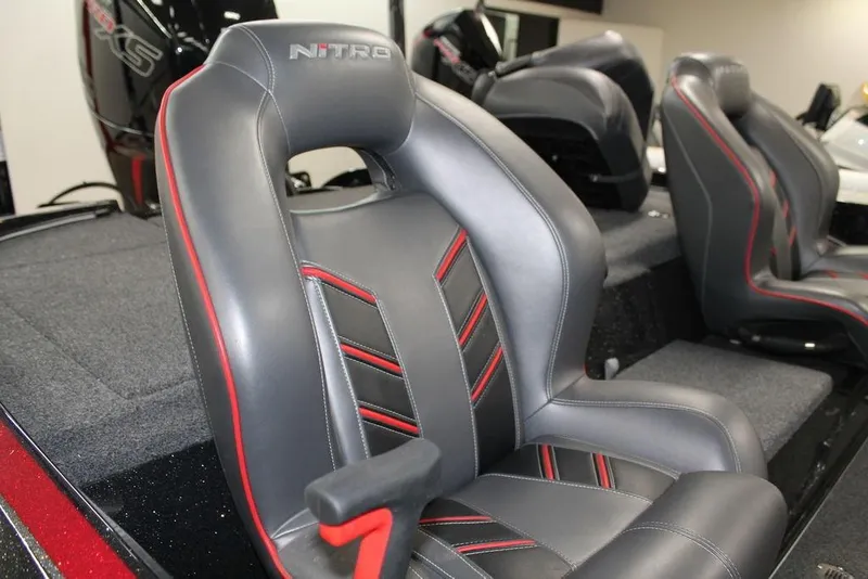 Slide: The Image of Luxurious seating in 2022 Nitro Z18 Pro boat with sleek black and red design. - 8