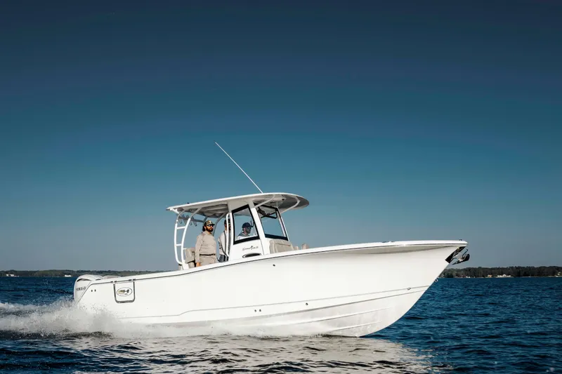 The Image of 2026 Sea Hunt Gamefish 28 Forward Seating boat cruising on open water. - 0