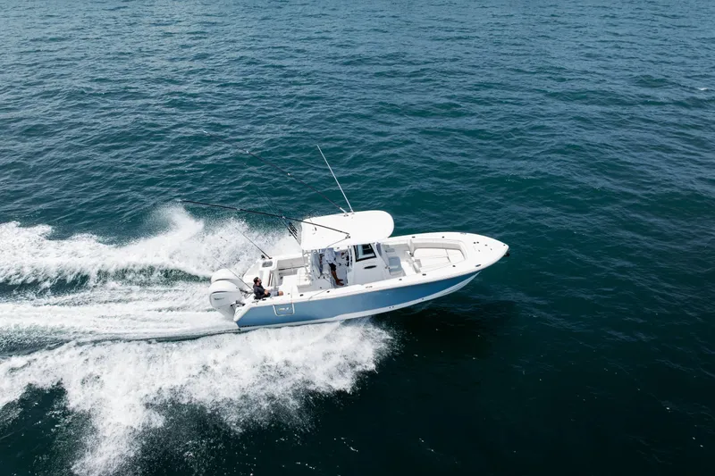 Slide: The Image of 2026 Sea Hunt Gamefish 28 Forward Seating cruising on open water. - 22