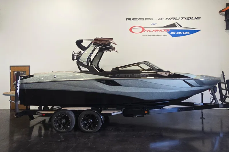 The Image of 2023 Centurion Fi23 boat on trailer at Regal & Nautique dealership. - 1