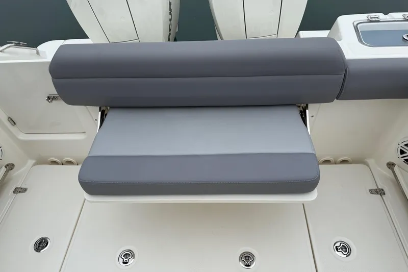 Slide: The Image of 2024 Boston Whaler 250 Outrage with dual Mercury outboard engines at marina. - 19