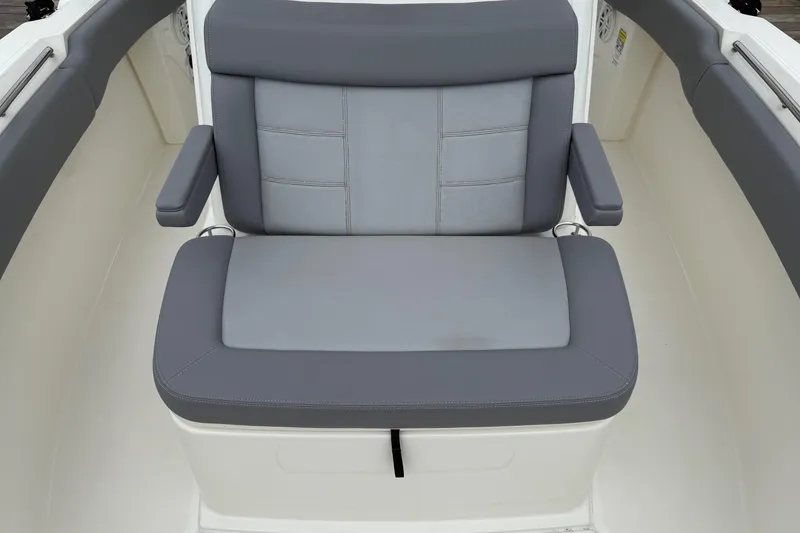 Slide: The Image of 2024 Boston Whaler 250 Outrage boat interior with seating and storage features. - 37