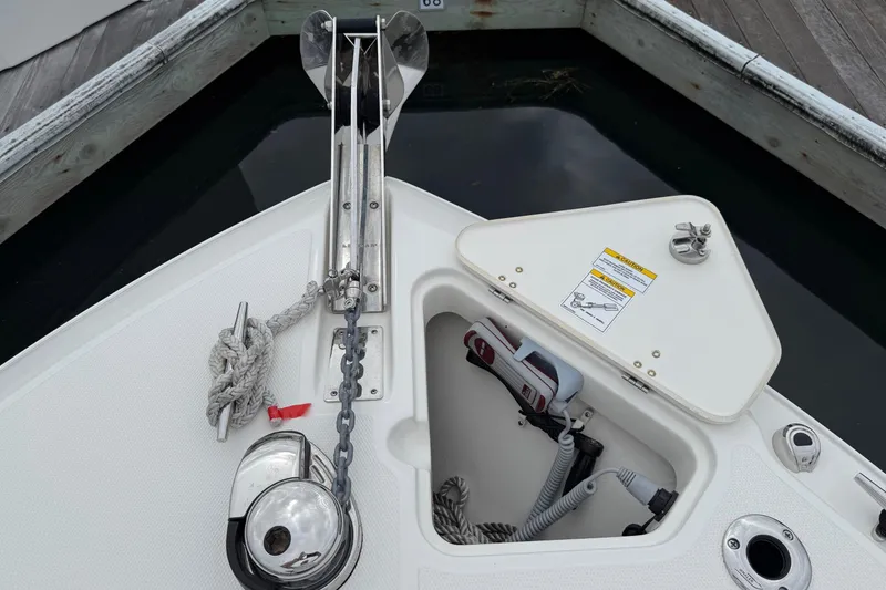 Slide: The Image of 2024 Boston Whaler 250 Outrage control panel with switches and keychains. - 46