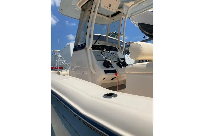 Slide: The Image of 2023 Grady-White Fisherman 257 boat interior with steering console and seating. - 9