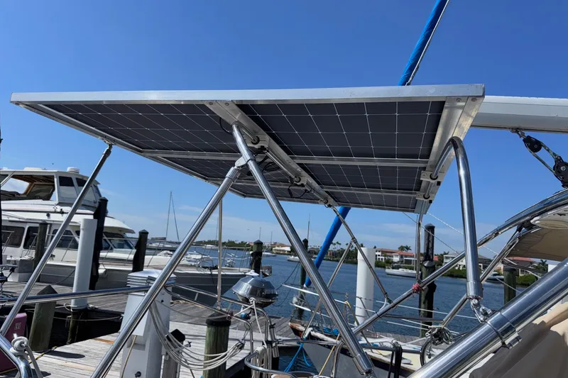 Slide: The Image of Solar panel on a 2005 Hunter 38 sailboat docked at a marina. - 25