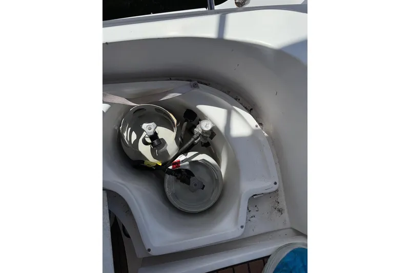 Slide: The Image of Propane tank storage on a 2005 Hunter 38 sailboat deck. - 36