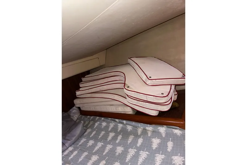 Slide: The Image of Stacked boat cushions in a 2005 Hunter 38 cabin interior. - 67