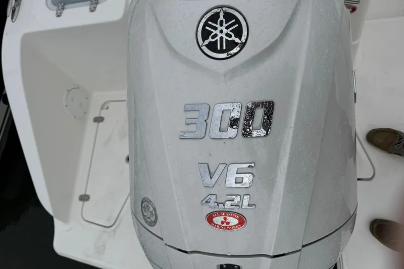 Slide: The Image of Yamaha 300 V6 4.2L outboard engine on 2024 Pursuit S 248 Sport boat. - 13