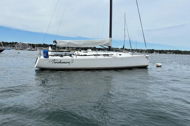 The Image of 2008 J Boats J/122 sailboat anchored in a calm harbor. - 0