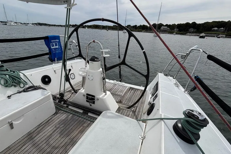 Slide: The Image of 2008 J Boats J/122 sailboat cockpit with steering wheel and nautical equipment. - 20