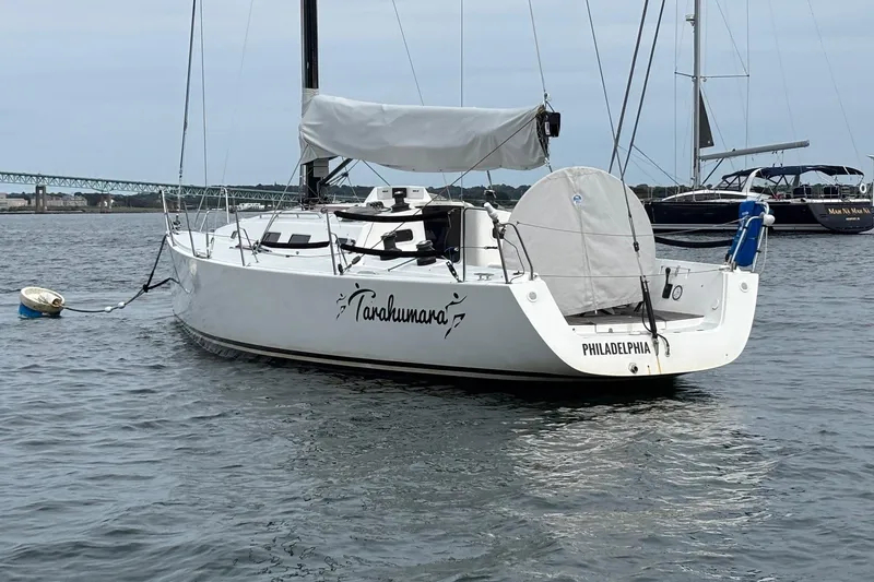 Slide: The Image of 2008 J Boats J/122 sailboat named Tarahumara moored in a harbor. - 3