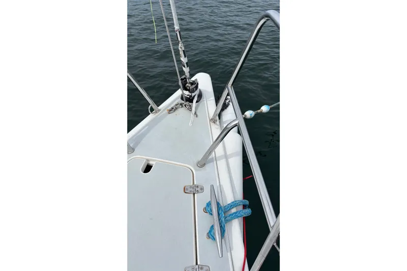 Slide: The Image of Bow of 2008 J Boats J/122 sailboat with cleat and railing. - 5