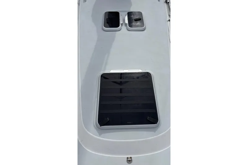 Slide: The Image of 2008 J Boats J/122 deck with hatches and sleek design. - 9