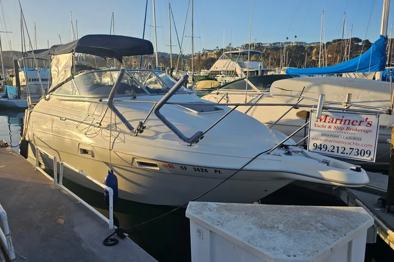 The Image of 1999 Maxum 2400 SCR boat docked at marina, available for sale by Mariner's Yacht Brokerage. - 0
