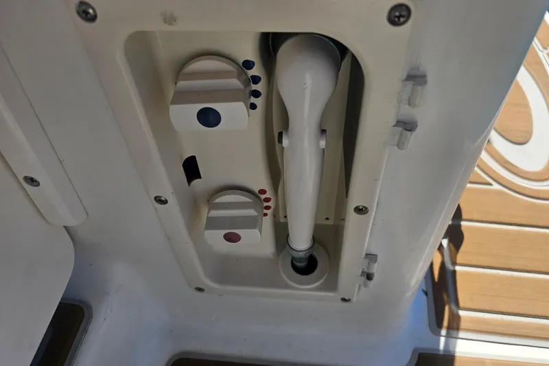 Slide: The Image of 1999 Maxum 2400 SCR boat shower controls with temperature adjustment knobs. - 15