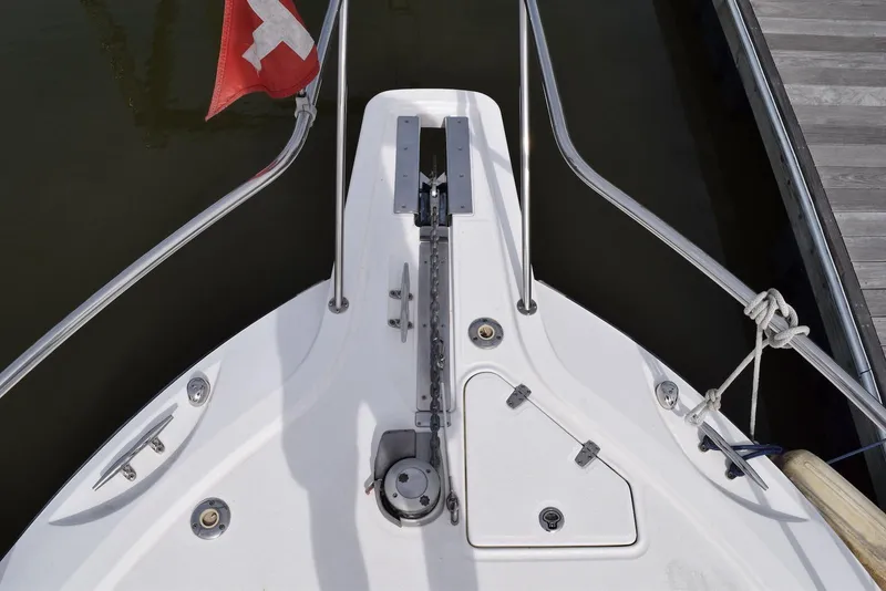 Slide: The Image of Bow of 2011 Boston Whaler 345 Conquest with anchor and Swiss flag. - 11