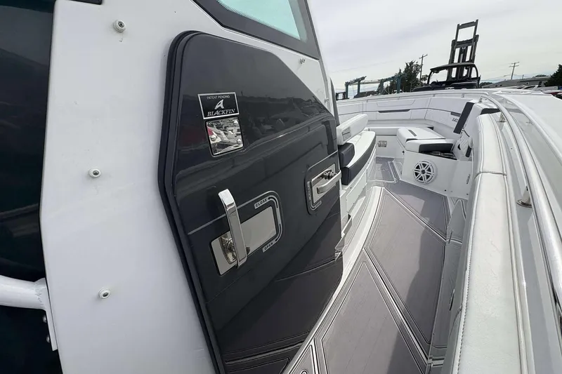 Slide: The Image of 2023 Blackfin 332cc boat interior with sleek design and modern features. - 11