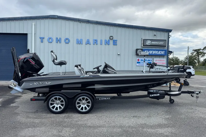 The Image of 2026 Caymas XS 20 Pro boat at Toho Marine dealership, featuring sleek design and dual seats. - 1