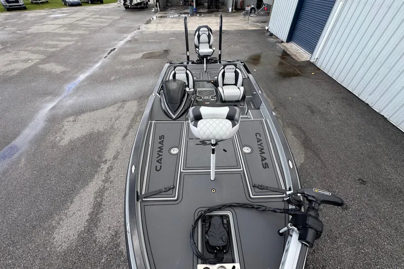 Slide: The Image of 2026 Caymas XS 20 Pro boat with sleek design and modern seating. - 13