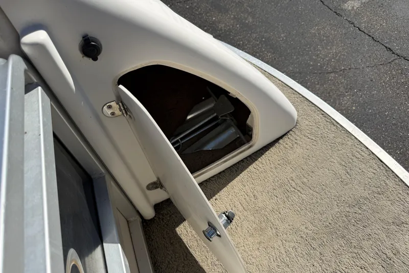 Slide: The Image of Open storage compartment on 2005 Harris FloteBote 270 Crowne boat deck. - 6
