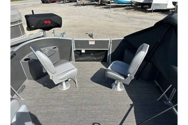 Slide: The Image of 2025 Bennington 20 SF Family boat interior with two fishing seats. - 16