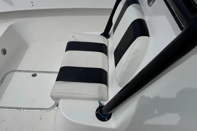 Slide: The Image of 2018 Cape Horn 27 boat seat with black and white striped cushions. - 12