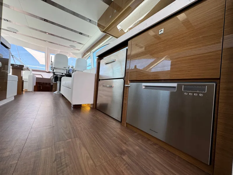 Slide: The Image of Interior of 2021 Cruisers Yachts 60 Cantius Flybridge with modern kitchen appliances. - 15