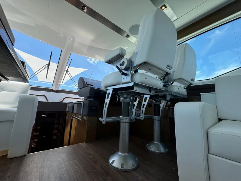 Slide: The Image of Luxurious interior of 2021 Cruisers Yachts 60 Cantius Flybridge with modern seating. - 22