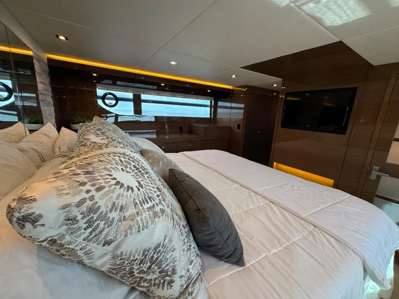 Slide: The Image of Luxurious bedroom interior of 2021 Cruisers Yachts 60 Cantius Flybridge. - 30