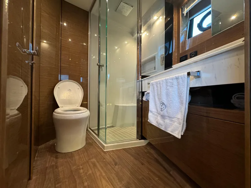 Slide: The Image of Luxurious bathroom in 2021 Cruisers Yachts 60 Cantius Flybridge with modern amenities. - 35
