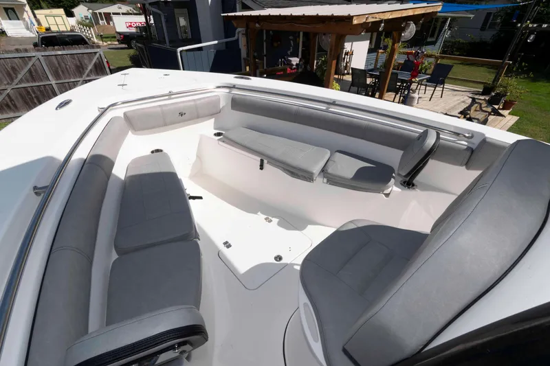 Slide: The Image of 2020 Sea Pro 259 Center Console boat with spacious seating area and modern design. - 12
