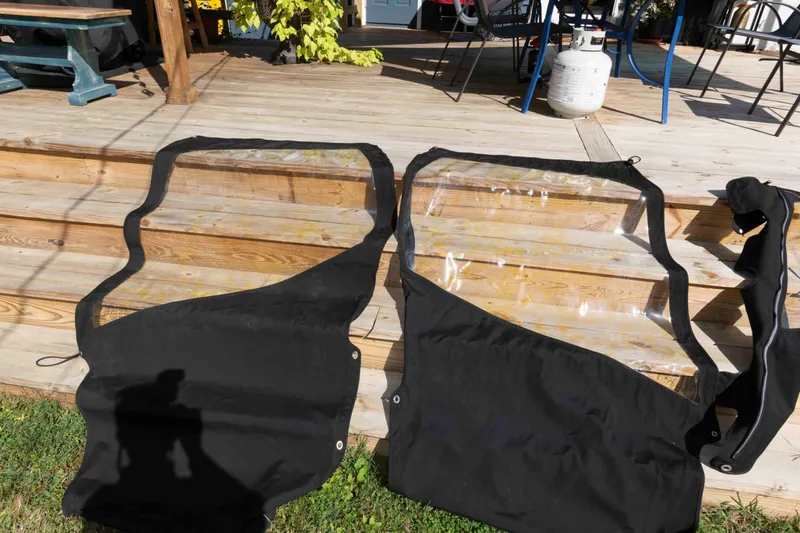 Slide: The Image of Protective covers for 2020 Sea Pro 259 Center Console on wooden deck. - 22