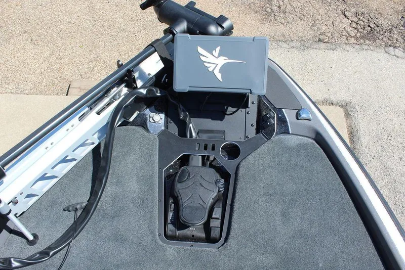 Slide: The Image of 2026 Skeeter FXR21 FLEX boat deck with control panel and foot pedal. - 15